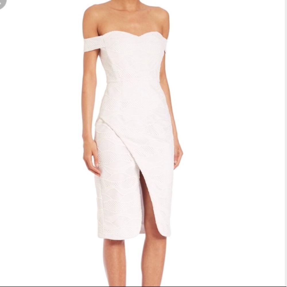 SOLD. Nicholas off shoulder white wave dress slit